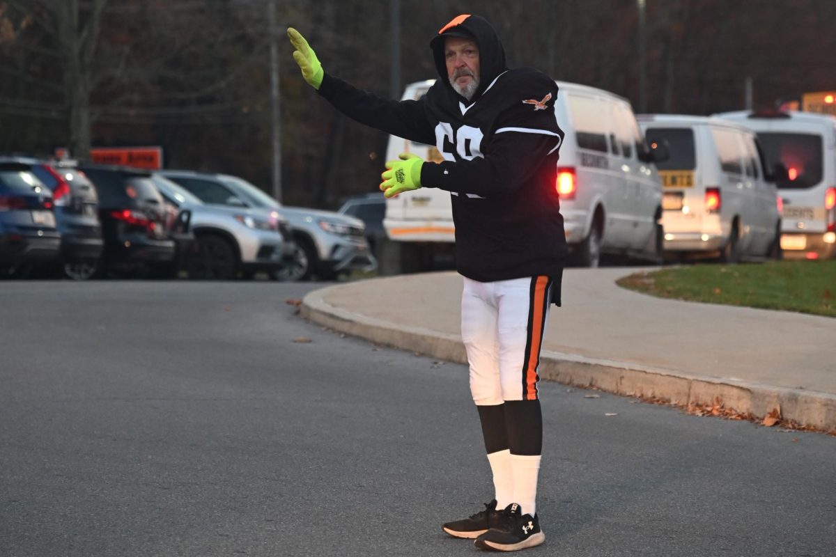 Ron dressed as a Tyrone football player directing traffic on Halloween morning.