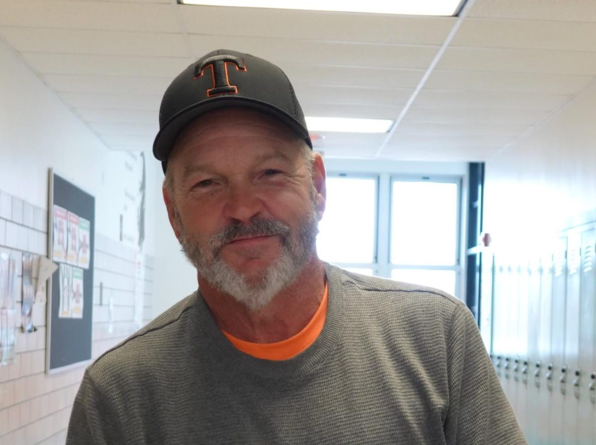 Tyrone's Ron Iddings is a crossing guard, security guard and a team manager at TAHS.  