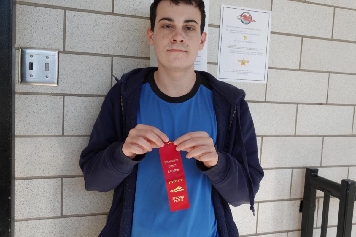 Vincent Maloney won this ribbon for second place doing butterfly.