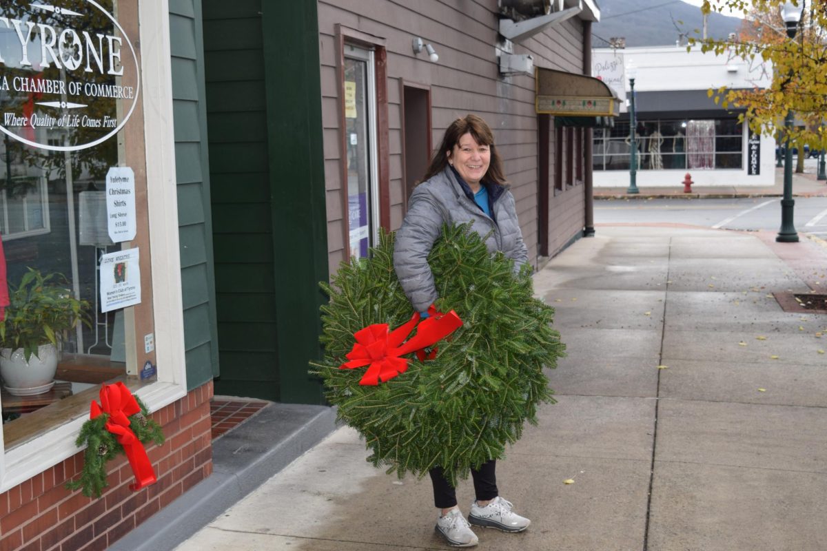 Tyrone Women's Club member Rose Black delivering wreaths. 