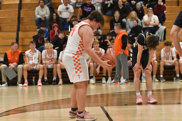 Logan Harpster takes a free throw