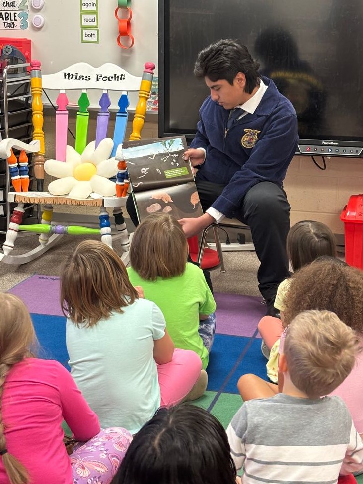 Diego Montiel Bonilla reading the book