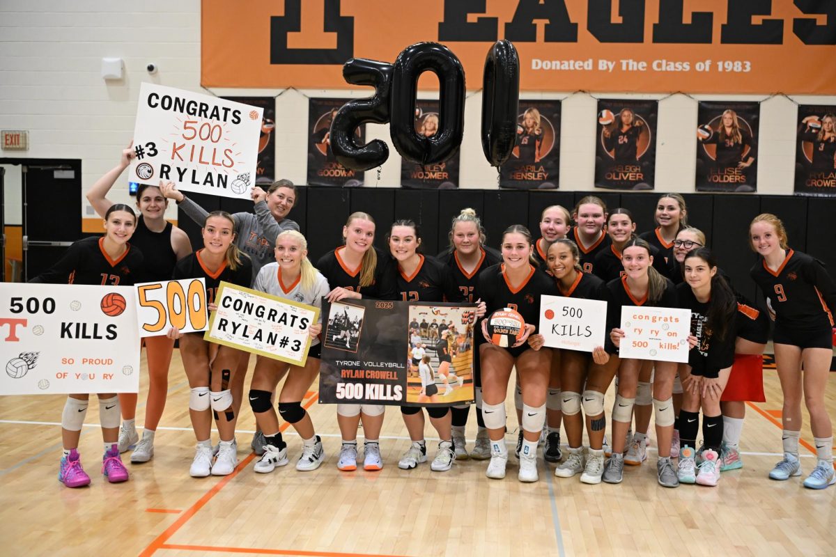 Rylan Crowell and the Lady Eagles celebrate Crowell's 500th kill
