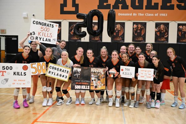 Rylan Crowell and the Lady Eagles celebrate Crowell's 500th kill
