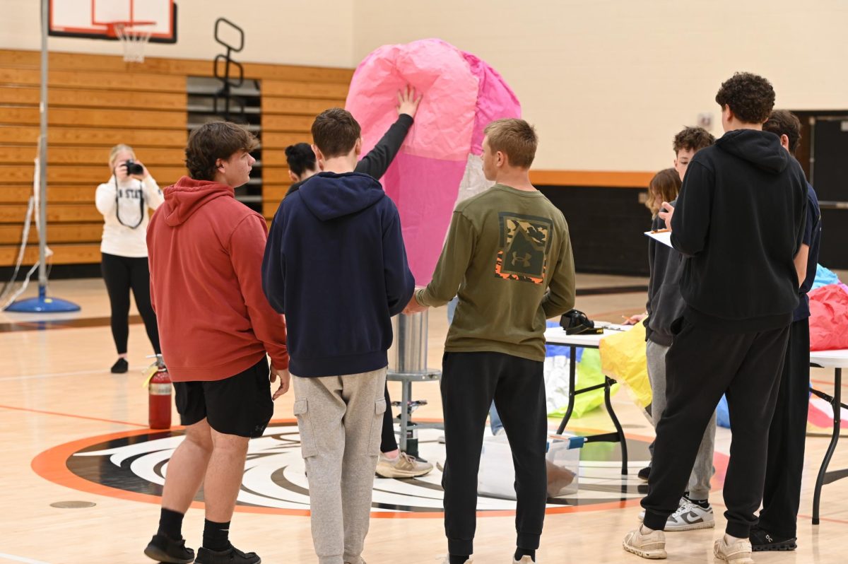 For this project, students in Mr. Foor's aviation class built balloons out of tissue paper and tape and tested their designs in the middle school gym.